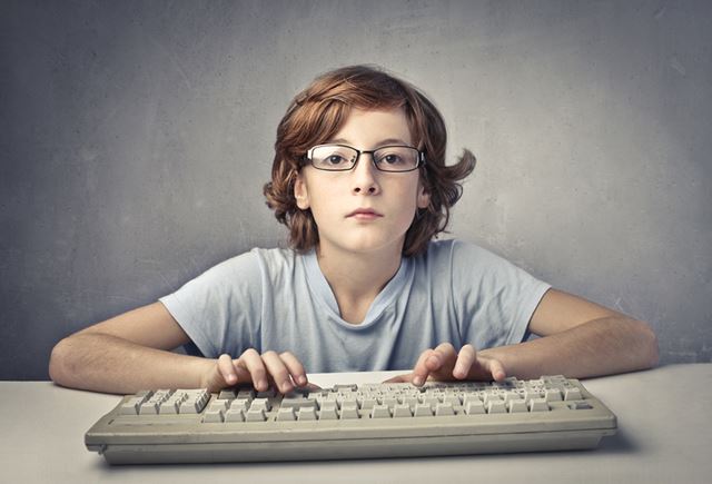 a boy typing